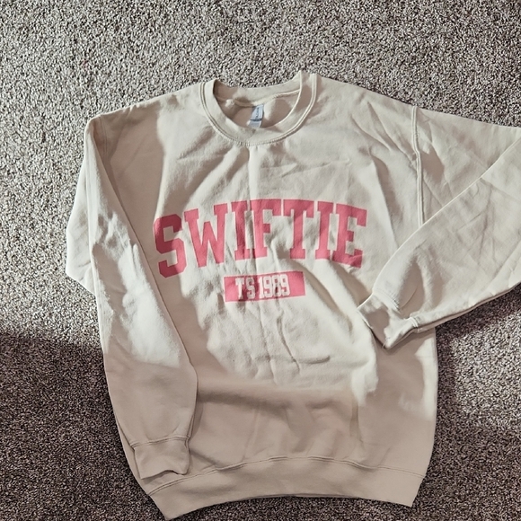 Gildan Tops - 🔥SWIFTIE🔥 Gildan Tan Crewneck Sweater with Pink Graphic